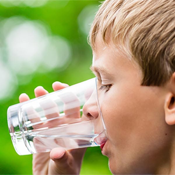 Boy drinking water