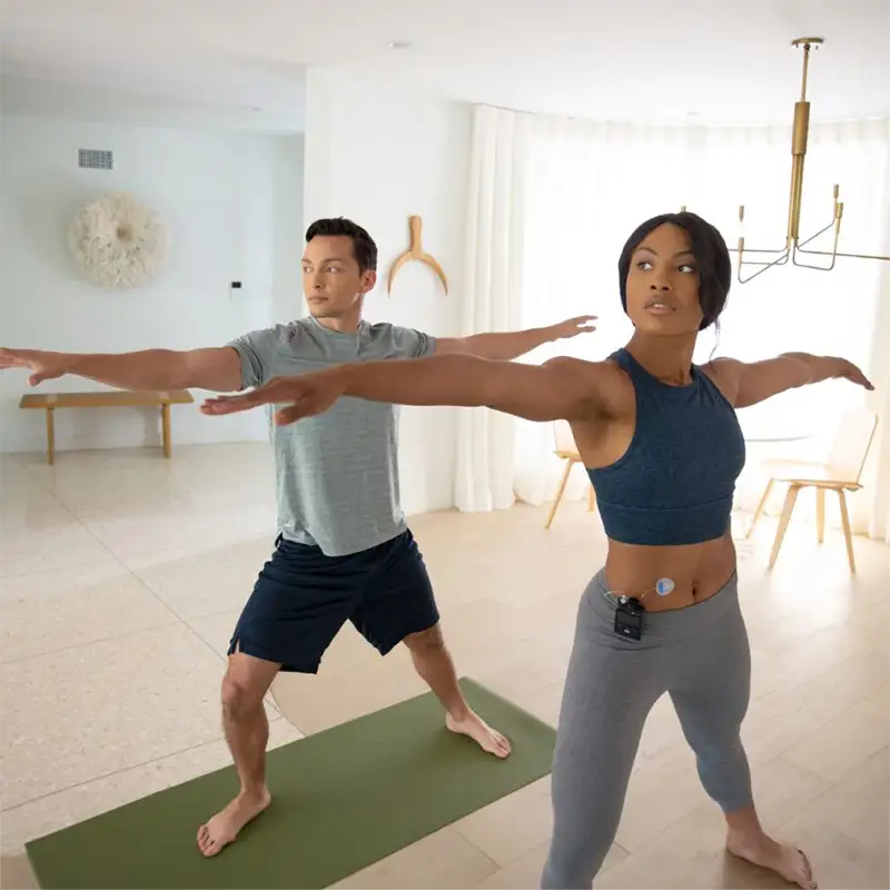 woman doing yoga wearing Extended infusion set